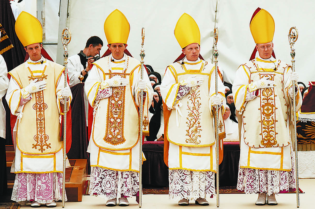 Traditionalist group defies pope, Vatican responds with excommunications