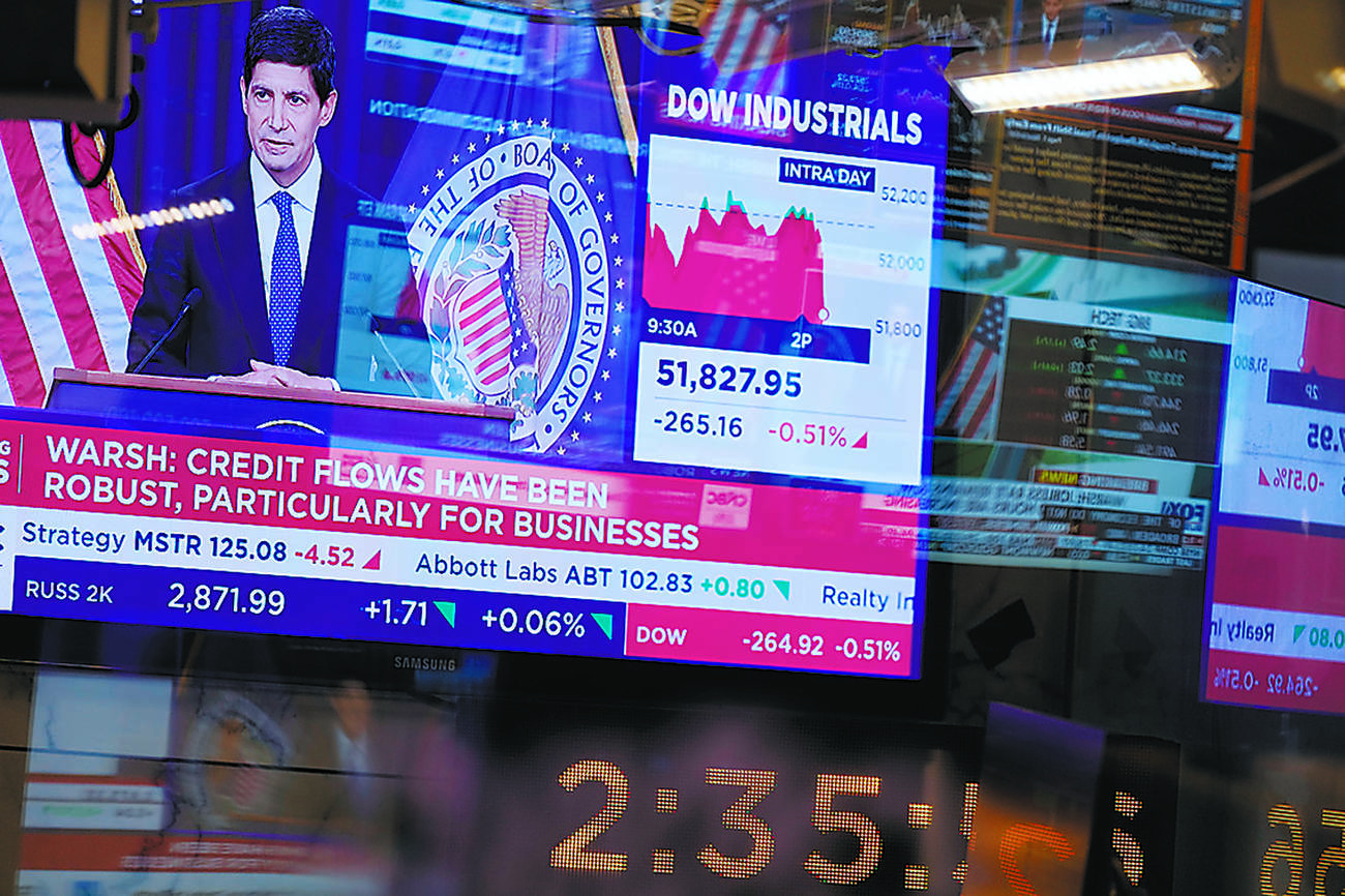 Fed hikes key rate for 1st time in 3 years, defying Trump demands for cut