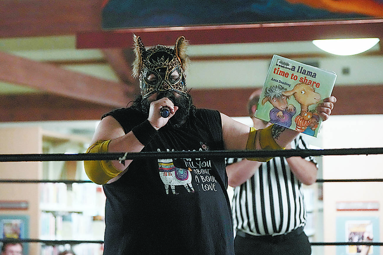 Live wrestlers tell kids stories at libraries