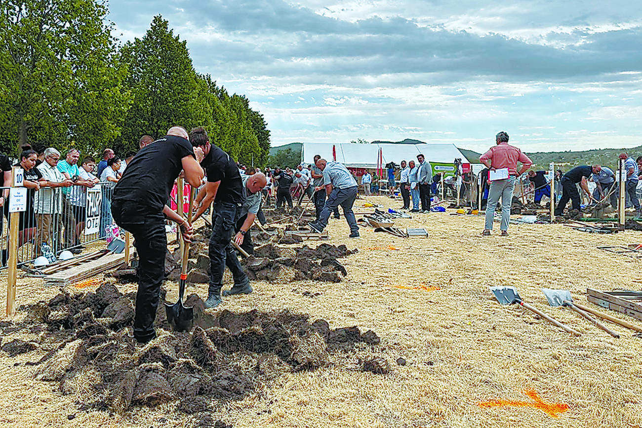 Teams dig deep in grave-digging contest