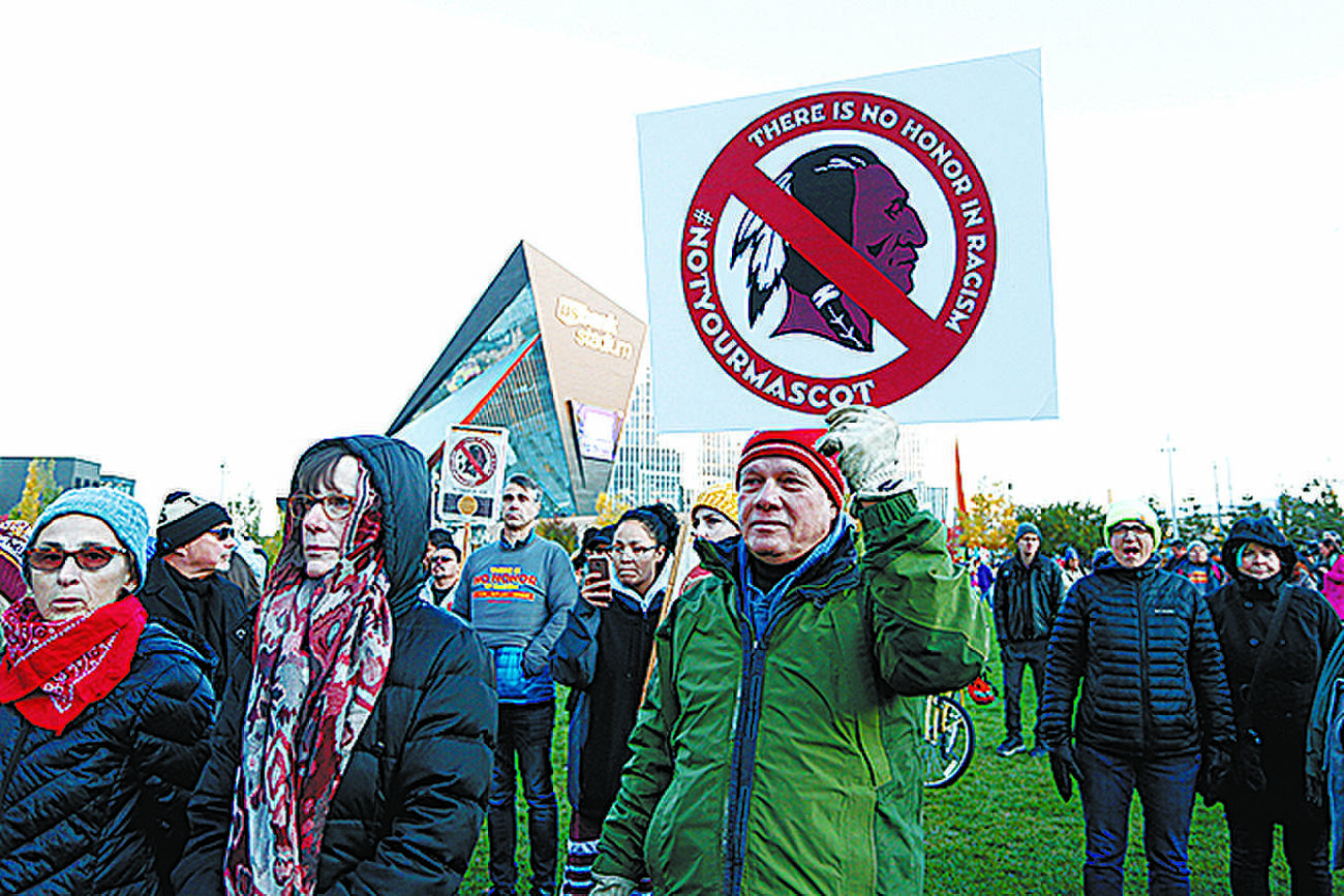 Native American leaders protest the Redskins team name and logo before an NFL game in Minneapolis in October 2019.

AP file photo